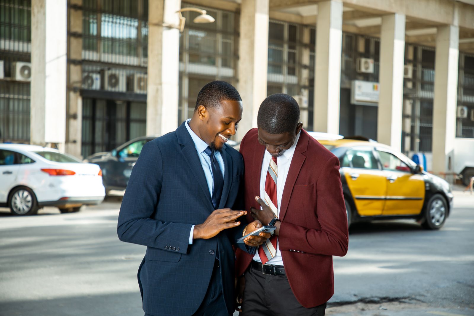 Two professional advisers in business suits meeting